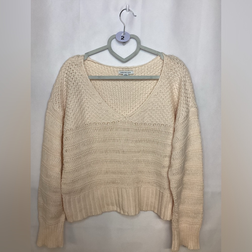 2. American Eagle cream knit sweater size M